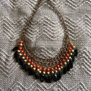 Gold necklace with orange accent 🧡